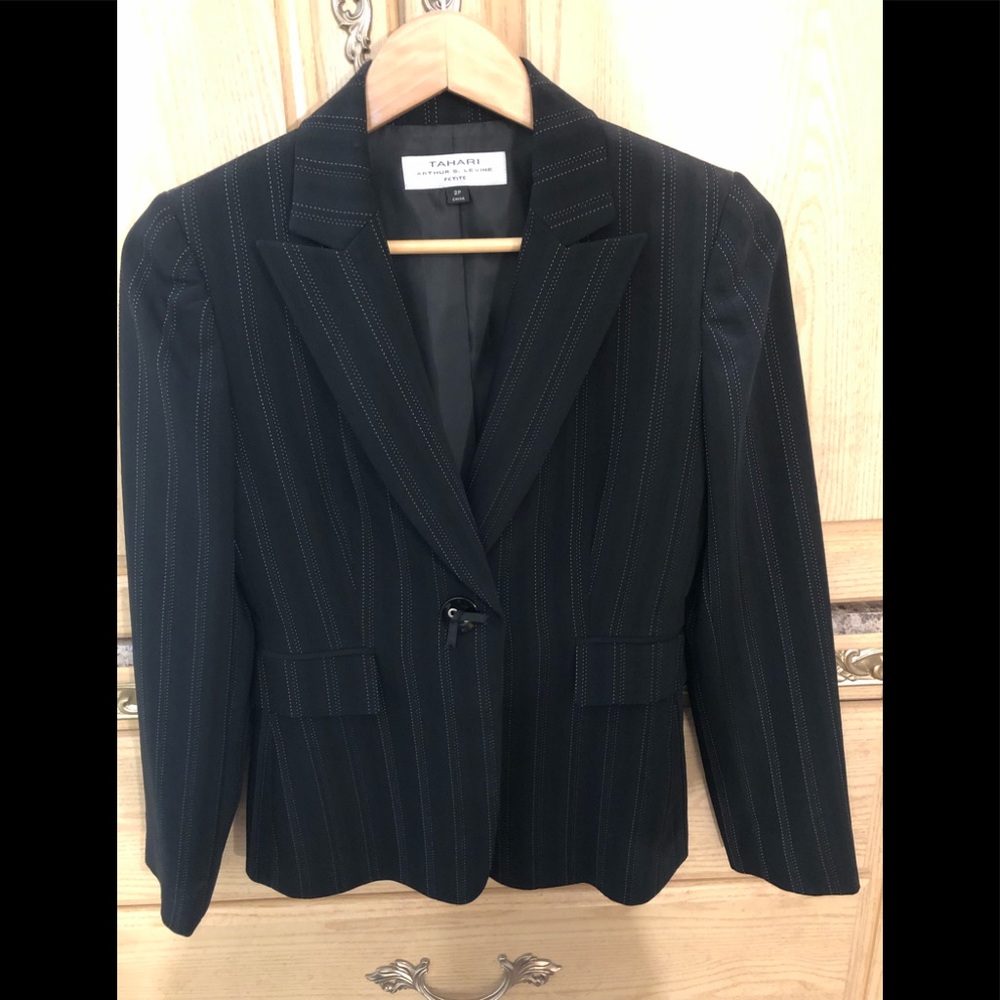 Women’s Tahari blazer.
